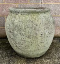 A large well weathered terracotta planter, 66cm high. Condition Report diameter at the top approx