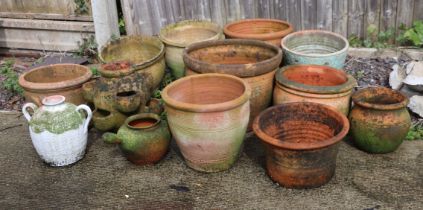 A quantity of terracotta planters, to include a strawberry planter.