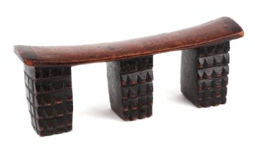 An African Tribal carved hardwood neck/head rest, 41cm wide. Condition Report This lot was entered