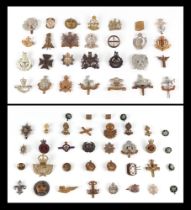 Assorted military cap badges, including Royal Marines, Royal Corps of Transport, Royal