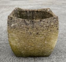 A well weathered shaped square form garden planter, 36cm wide.