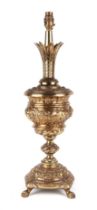 A Victorian style gilt metal table lamp with lion paw feet, 58cm high; together with another similar