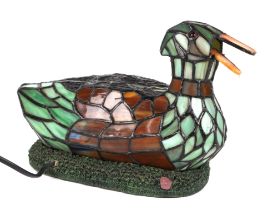 A Tiffany style lamp in the form of a duck, 15cm wide.