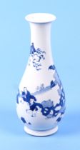 A Chinese blue and white baluster vase, decorated with young boys playing, 22cm high.