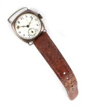 A silver cased trench watch, the white enamel dial with Roman numerals and subsidiary seconds.