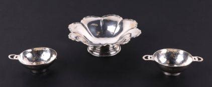 A pair of beaten silver Quaich's (one with missing handle), Birmingham 1923, together with a mid