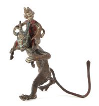 A cold painted bronze group, depicting a small devil riding the shoulders of a larger devil, 7cm