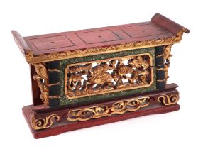 A Chinese red lacquer and gilt carved wood alter stand, 30cm wide. Condition Report Crack running