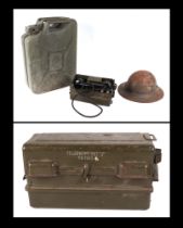 A WWII metal carry case to hold 3.7inch Anti Aircraft shells. In raised relief on the lid it