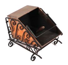 A copper coal scuttle, with wrought iron frame, 29cm wide.