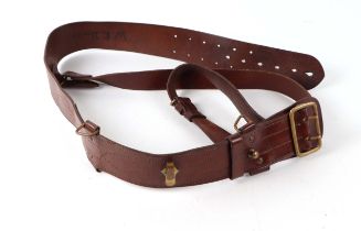 A brown leather Sam Browne belt.