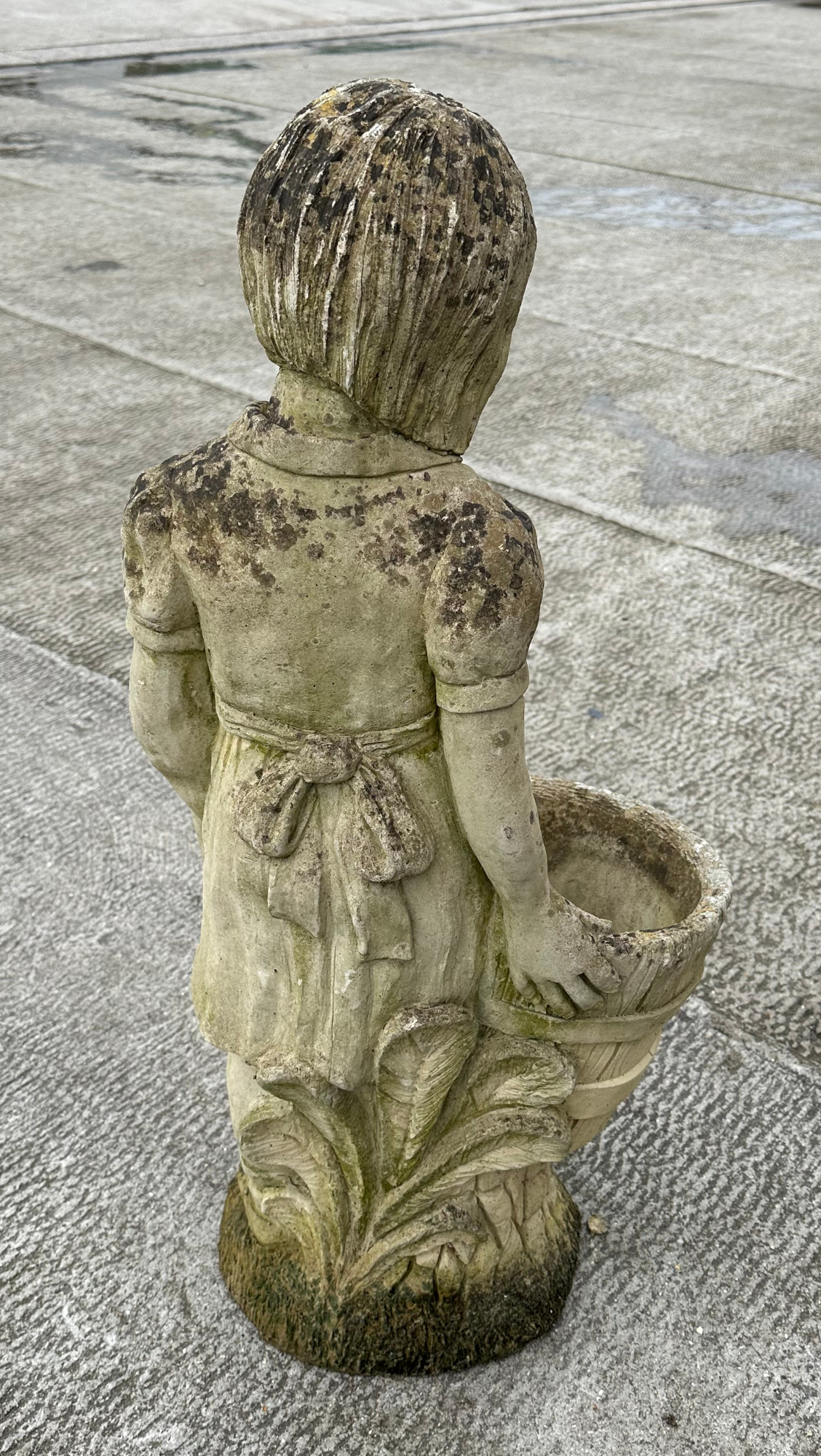 A well weathered stoneware garden ornament, depicting a young girl holding a barrel, 83cm high. - Image 4 of 4