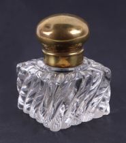 A 19th century French crystal inkwell, possibly Baccarat, with brass cover, 11cm high.