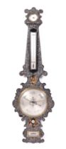 A Victorian wheel barometer with thermometer, dry, damp and level, in an ebonised and mother of