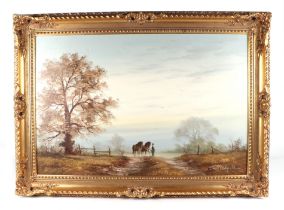 B Oldfield, a pastoral landscape with a ploughing team in the fore ground, oil on canvas, signed
