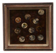 A group of Boer War button badges, depicting Boer War Generals, framed and glazed.