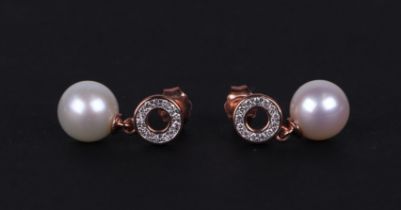 A pair of 9ct rose gold pearl and diamond halo bail earrings.
