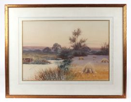 Fredrick Gordan Fraser (1879-1931), a rural landscape, with corn stooks next to a river bank,