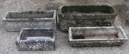 Four well weathered rectangular garden planters, largest 71cm wide (4). Condition Report The largest