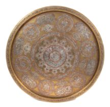 A large Damascus mamluk brass tray, with silver overlay decoration, 69cm diameter.