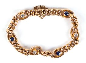 A 15ct gold bracelet, set with three diamonds and three sapphires, 20.8g. Condition Report The