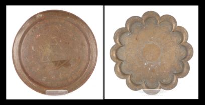 A brass Islamic tray with lobbed rim and engraved decoration, 40cm wide and a Chinese brass tray,