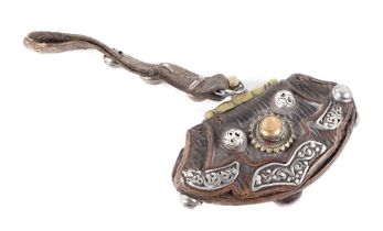 A 19th century Sino Tibetan or Bhutanese tinder pouch, with brass and white metal decoration, 13cm