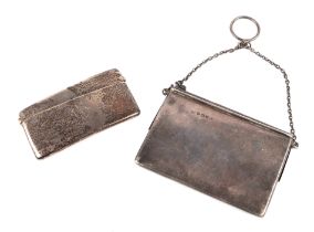 An Edwardian silver visiting card case with safety chain, Birmingham 1909, together with a small