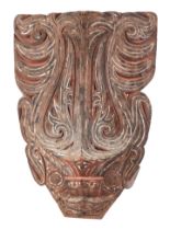 An Indonesian Dayak stylised wall mask, 39 by 52cm.