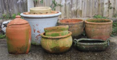 A quantity of terracotta planters.