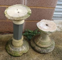 Two well weathered stoneware columns, 57 and 36cm high (2).