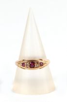 An 18ct gold and diamond ruby gypsy style ring, approx UK size O, 2.6g. Condition Report One small