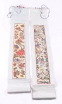 Two Chinese embroidered panels, one decorated with butteries and scrolling flowers, 9 by 51cm, the