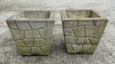 A pair of well weathered stoneware garden planters, of square tapering form, 31cm wide.