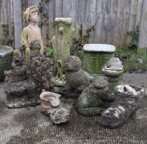 A group of stoneware garden ornaments, to include figures and columns, largest 61cm high (9).