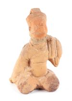 A Chinese terracotta tomb figure, 21cm high. Condition Report Possible repair to left knee and top