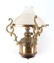 A brass hanging lamp with Holophane type shade, 34cm high.