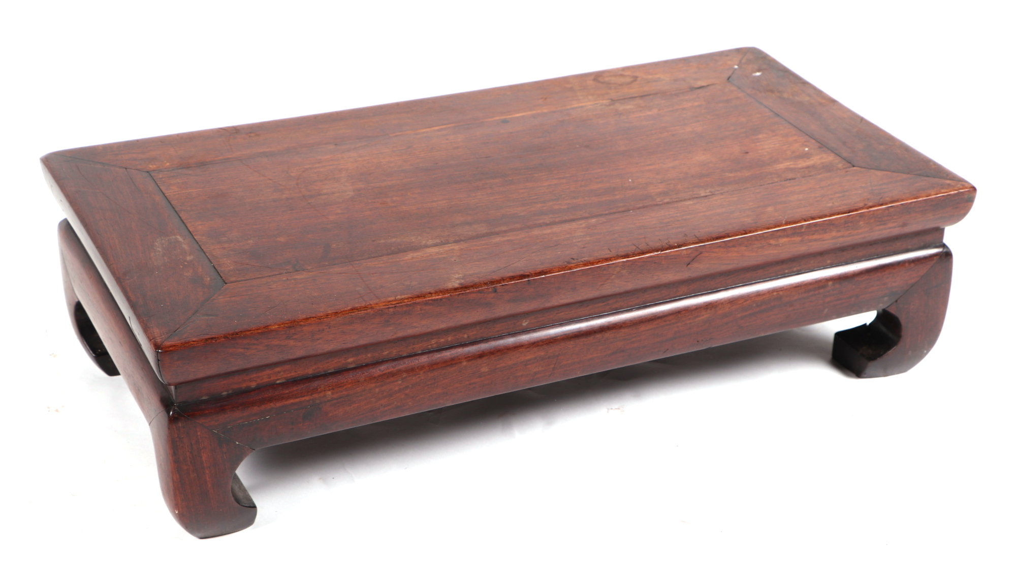 A Chinese hardwood low table, 60cm wide. Condition Report 16cm high.  Water marks on the top and