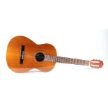 A Goya model 4 Spanish acoustic guitar, in a soft carry case.