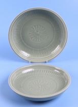 A Chinese celadon glaze shallow dish, with six character blue marks to the underside, 26cm diameter,