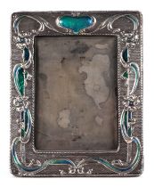 An Art Nouveau style silver and enamel strut photograph frame, possibly Chester 1932, overall 15
