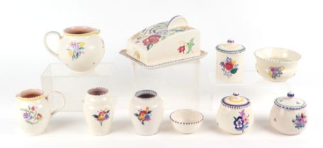 A small collection of Poole pottery, the majority designed by Truda Carter, including simplified