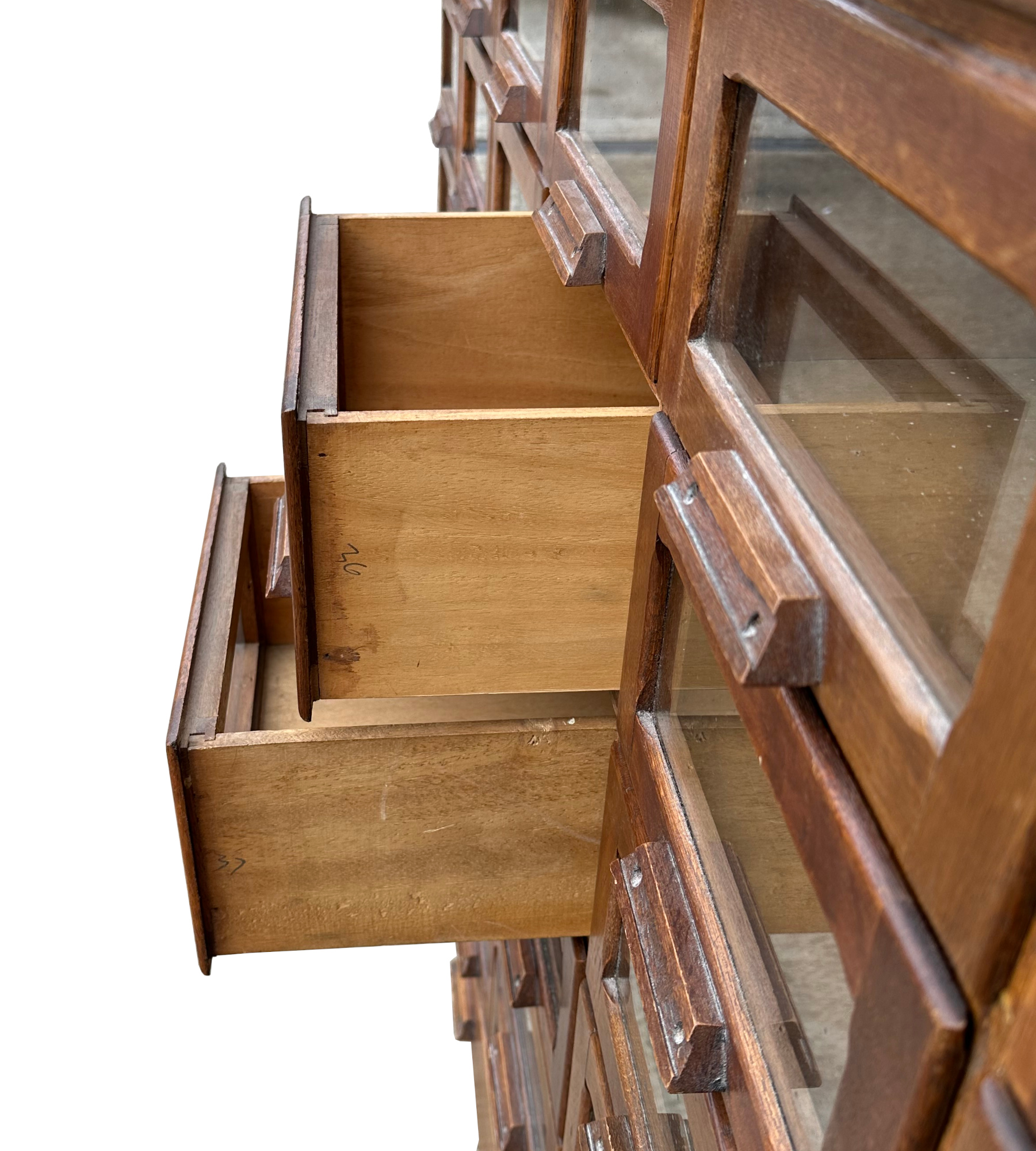 A mid century substantial haberdashery cabinet, with sixty oak fronted glazed drawers, above three - Image 6 of 10
