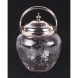 A late Victorian silver mounted etched glass biscuit barrel, London 1900, 19cm high. Condition