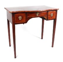 A 19th century mahogany serpentine front side table, having an arrangement of three drawers on