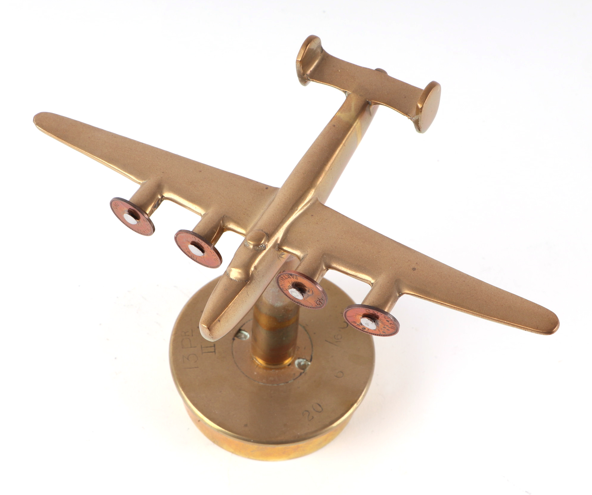 A trench art cast brass model of Wellington Bomber, mounted on a brass shell case, wingspan 22cm. - Image 2 of 2