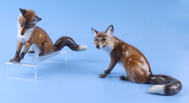 Two Rosenthal porcelain model of seated foxes, designed by M H Fritz, all having impressed and