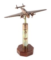 A trench art cast brass model of Blenheim Light bomber aircraft, mounted on a brass plinth, wingspan