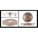 A silver plated punch bowl, a large circular silver plated tray, a rectangular silver plated two