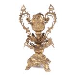 A Victorian cast brass table centre piece, with pierced decoration, 35cm high.